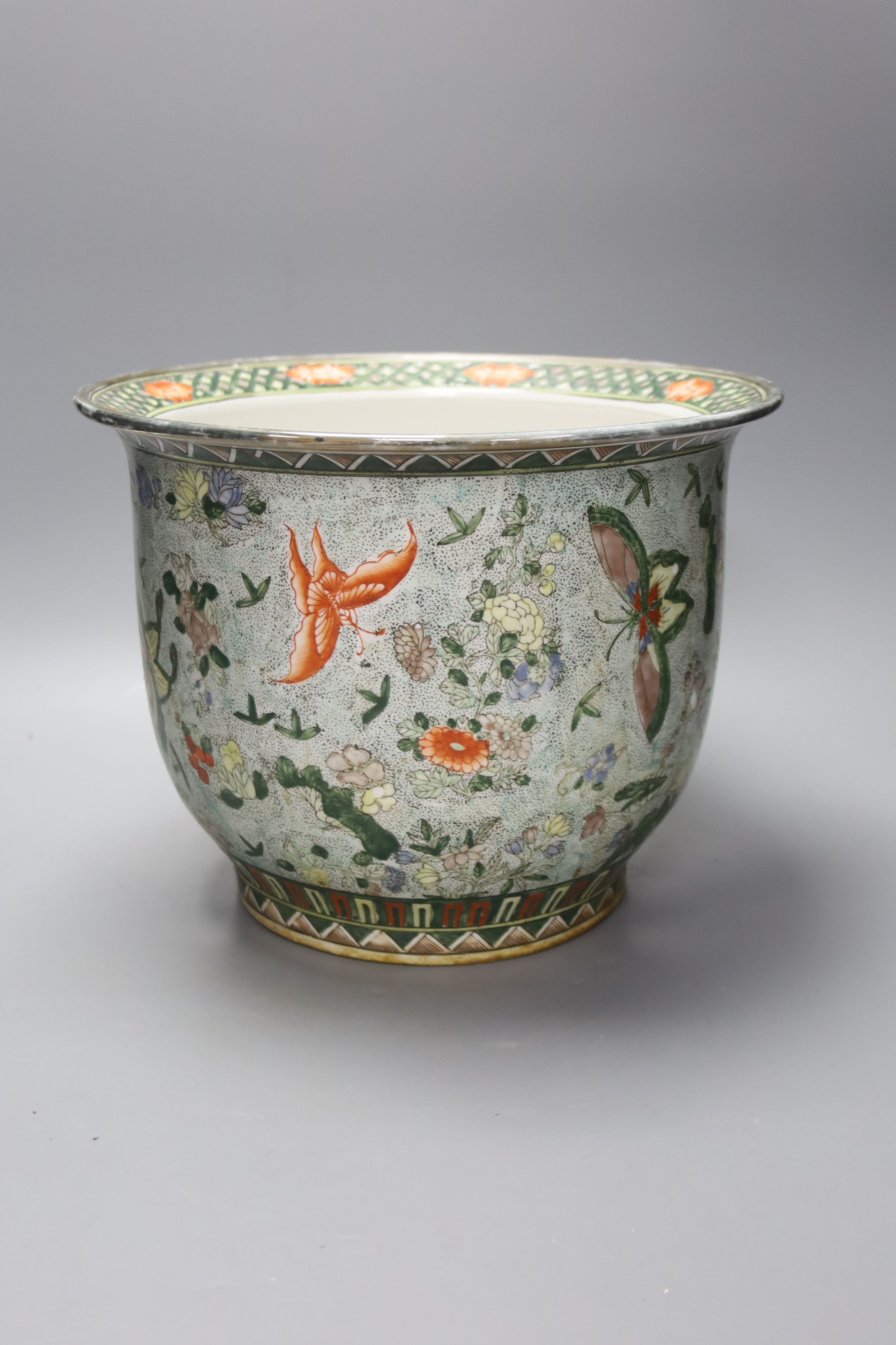 A 20th century Chinese pale blue ground jardiniere, painted with flowers and insects, height 24cm